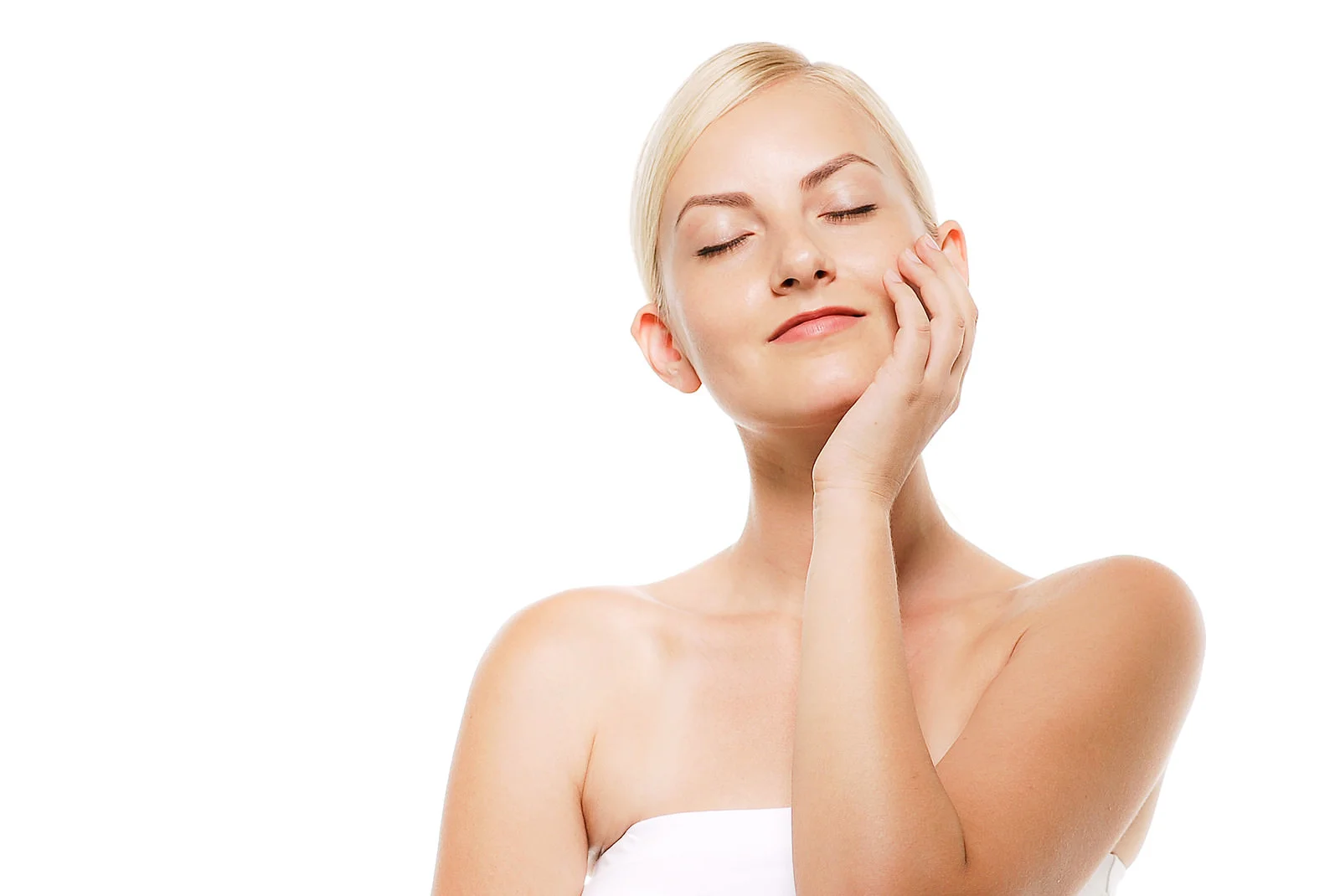 歯をおさえる女